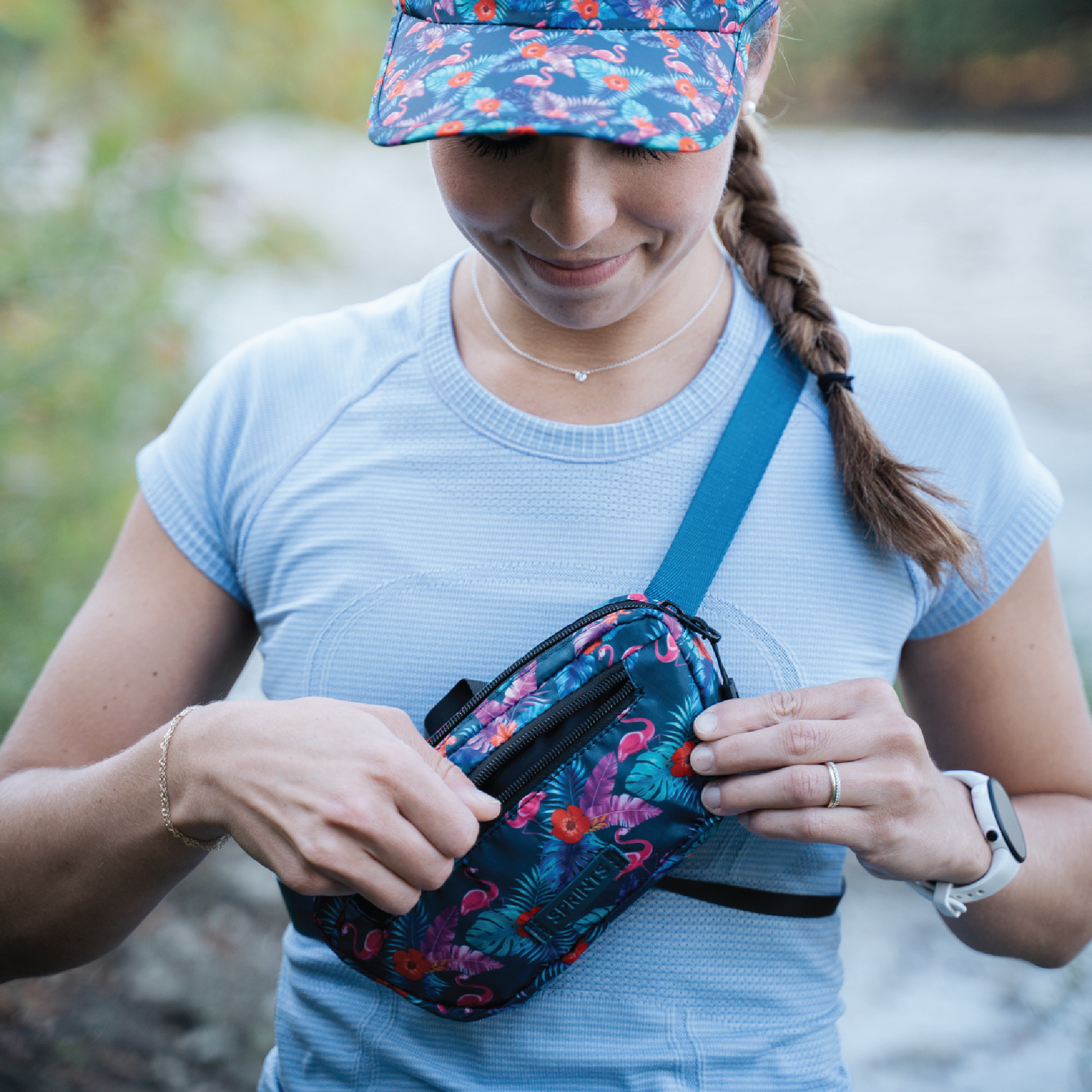 girl unzipping bag